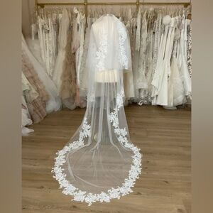 Ivory brand new silk lace cathedral style wedding veil.